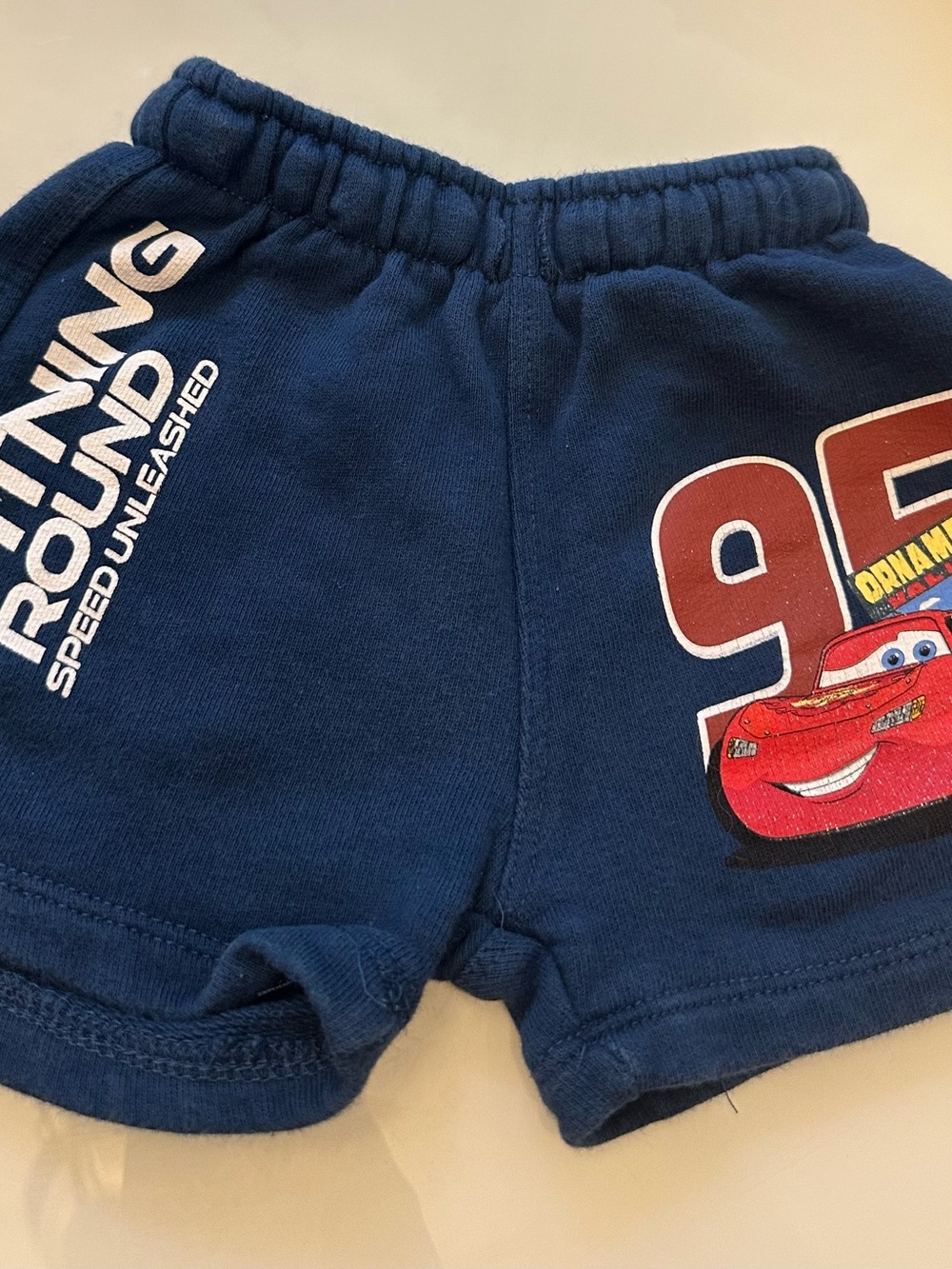 Zara Navy Blue Kids Shorts with Red Race Car Graphic